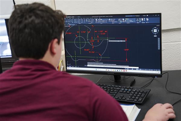 Architecture and Construction Engineering students working on computers 